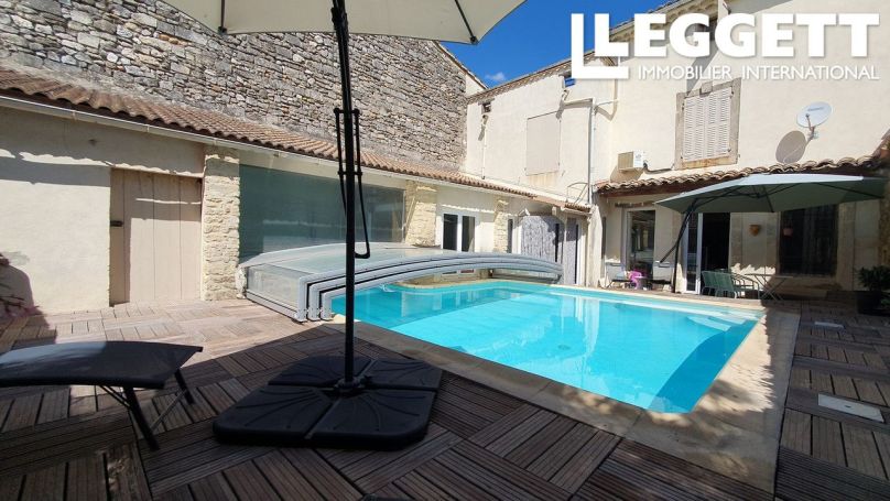 A vendre Maison de village spacieuse et de caractÃ¨re avec piscine et garage dans un village entre NÃ®mes et Avignon 30210 Fournes