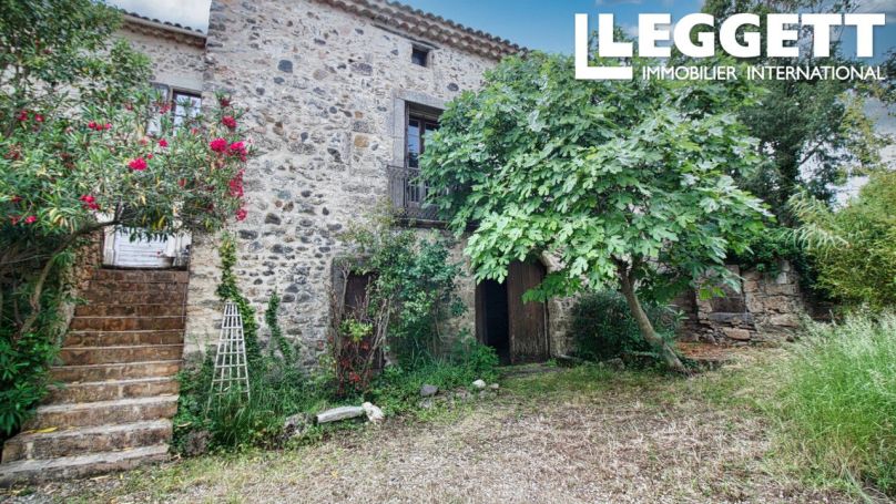 A vendre Charmante maison de caractÃ¨re, 4 chambres, avec jardin dans un joli village proche de Clermont l'Herault